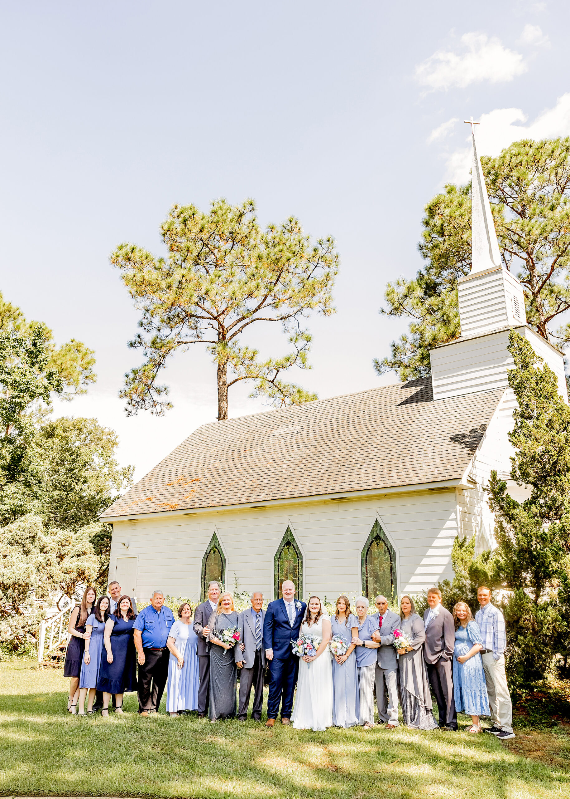 Entire family at couples wedding pose at Gulf Shores Wedding Chapel